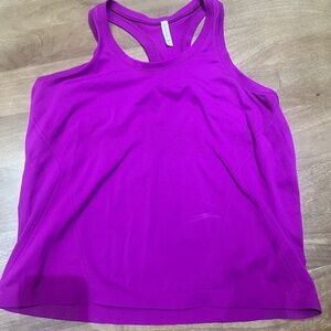 Athlete magenta pink tank top.